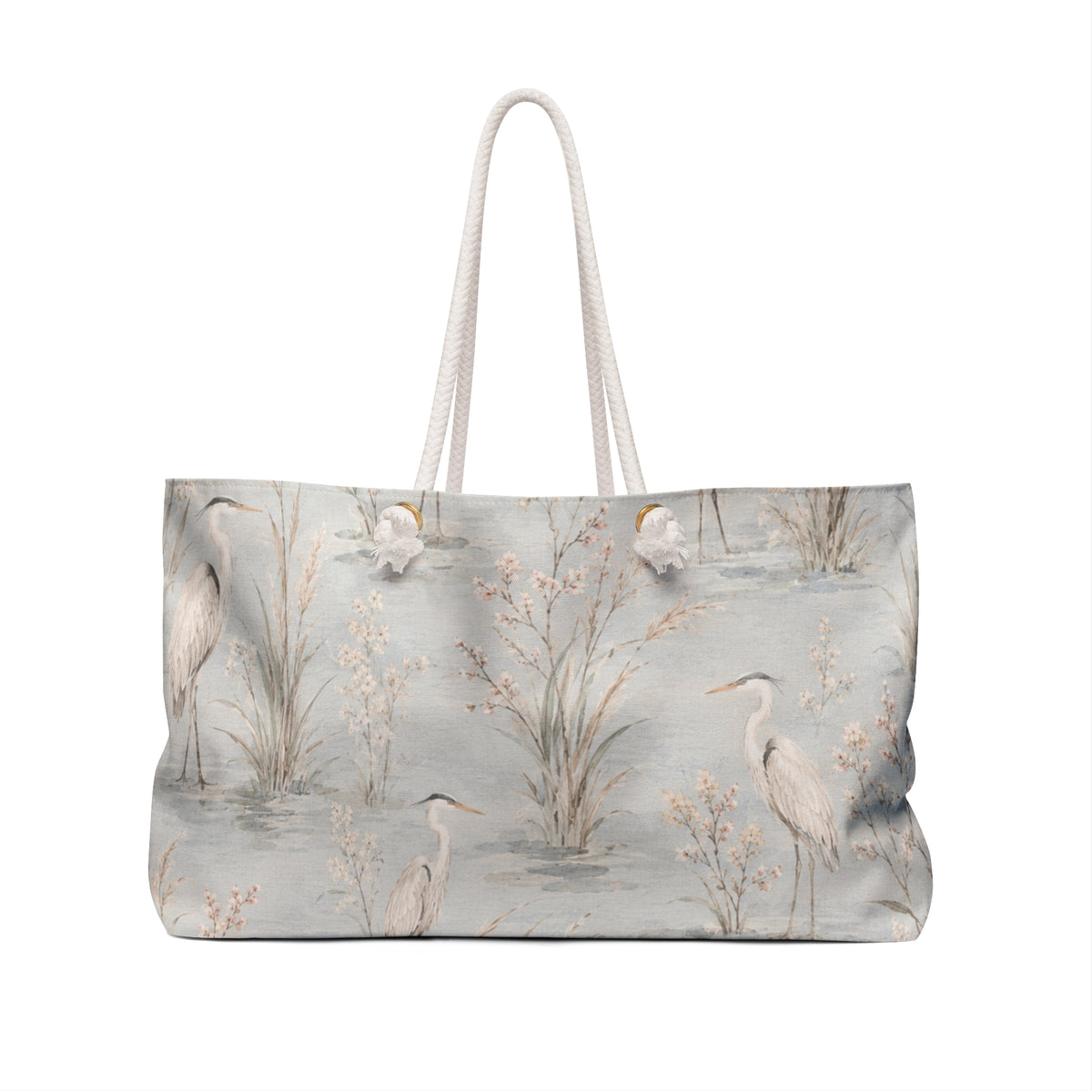 Heron Marsh Weekender Bag — angled view showing cotton rope handles and gold-toned grommets