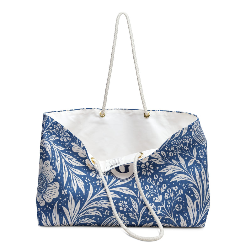 Blue Floral Monogram "G" Weekender Bag – close-up detail of the monogrammed "G" on the floral print