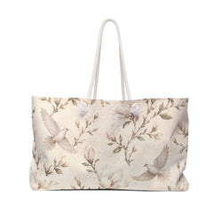 Floral Dove Weekender Bag in neutral botanical print — front view