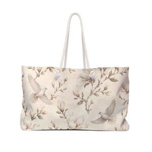 Floral Dove Weekender Bag in neutral botanical print — front view