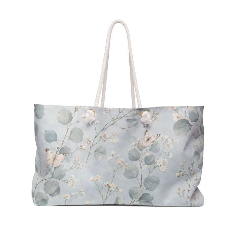 Floral Eucalyptus Weekender Bag in soft blue botanical print — front view