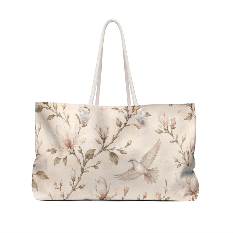 Floral Dove Weekender Bag — angled view showing cream rope handles and gold-color grommets