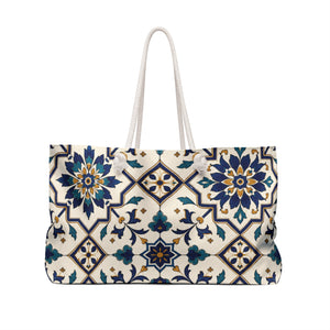 Monogram "H" Tile-Print Weekender Bag – side view highlighting the cream cotton rope handles and gold-tone grommets