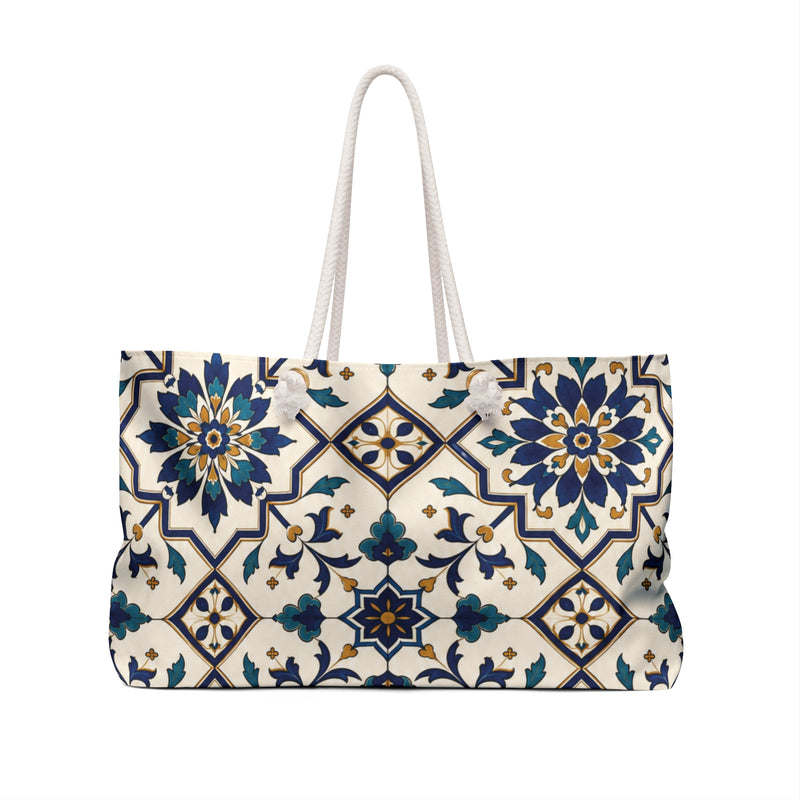 Monogram "H" Tile-Print Weekender Bag – side view highlighting the cream cotton rope handles and gold-tone grommets