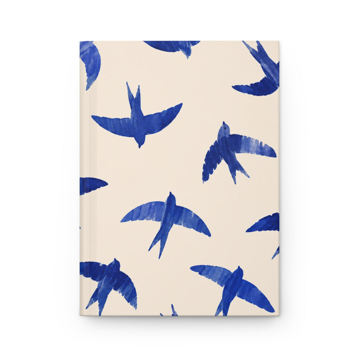 Blue Swallow Hardcover Journal, front cover, closed on a flat surface