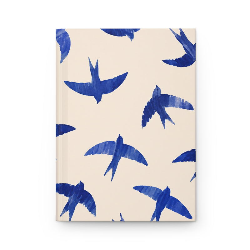 Blue Swallow Hardcover Journal, front cover, closed on a flat surface