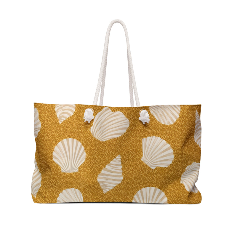 Seashell Sand Weekender Bag — front view showing the full exterior print, cream shell motifs on golden-sand canvas
