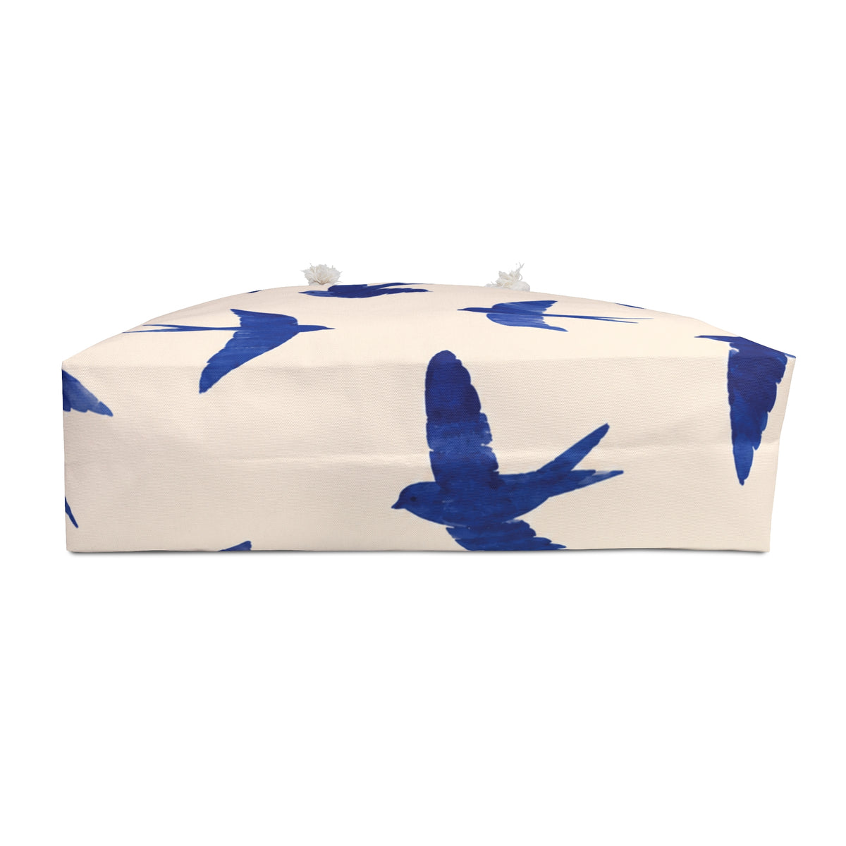 Blue Swallow Print Weekender Bag shown flat, highlighting the roomy T-bottom and cream cotton-blend lining