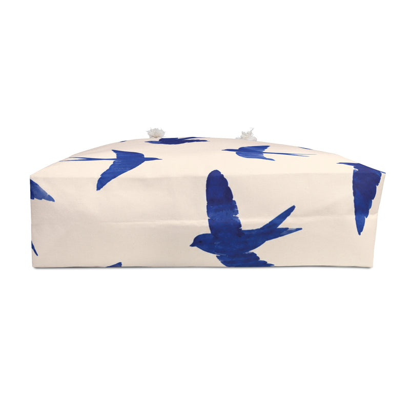 Blue Swallow Print Weekender Bag shown flat, highlighting the roomy T-bottom and cream cotton-blend lining