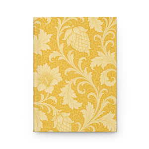 Gold Floral Hardcover Journal, front cover, closed on a flat surface