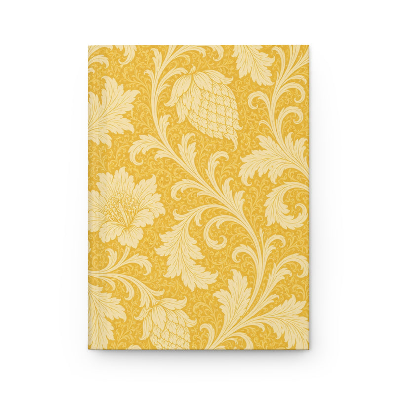 Gold Floral Hardcover Journal, front cover, closed on a flat surface