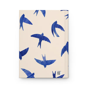 Blue Swallow Hardcover Journal opened flat, showing lined interior pages