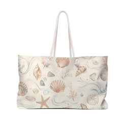 Seaside Shell Weekender Bag in coastal watercolor print — front view
