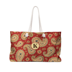 Paisley Monogram Weekender Bag — front view showing the red paisley print and "K" monogram