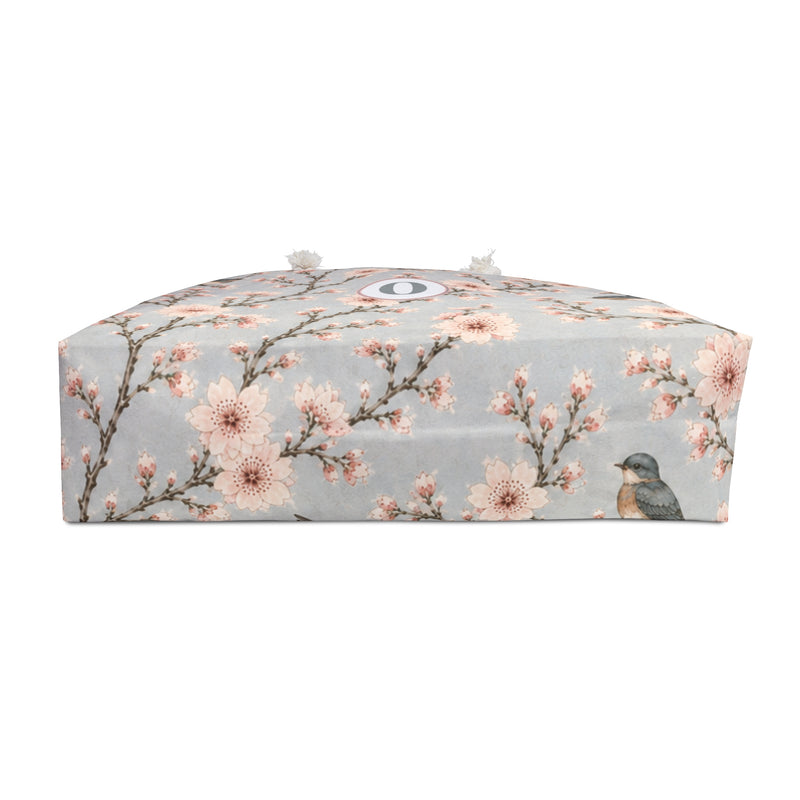 Cherry Blossom & Swallow Monogram Weekender Bag shown flat, highlighting the roomy T-bottom silhouette
