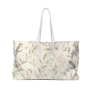 Floral Bird Weekender Bag — front view showing watercolor floral sprigs and songbirds on cream fabric