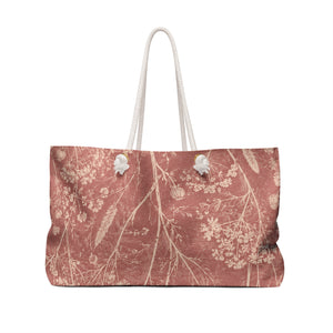 Floral Monogram "F" Weekender Bag – side view highlighting the cream cotton rope handles and gold-tone grommets