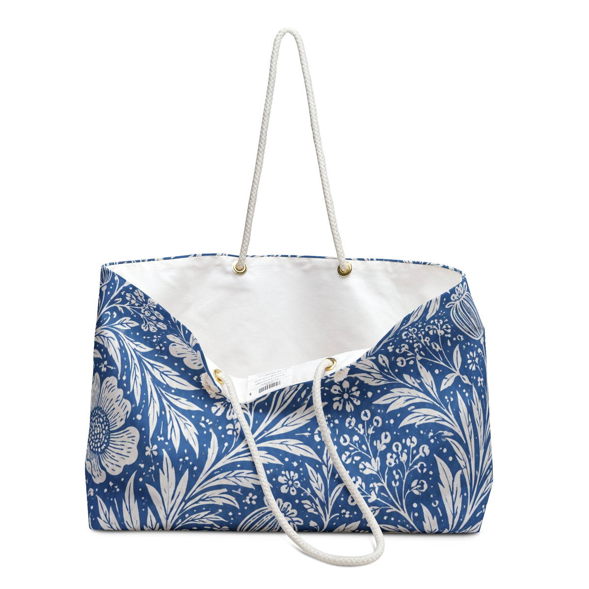 Blue Floral Weekender Bag – close-up detail of the botanical floral print and T-bottom construction