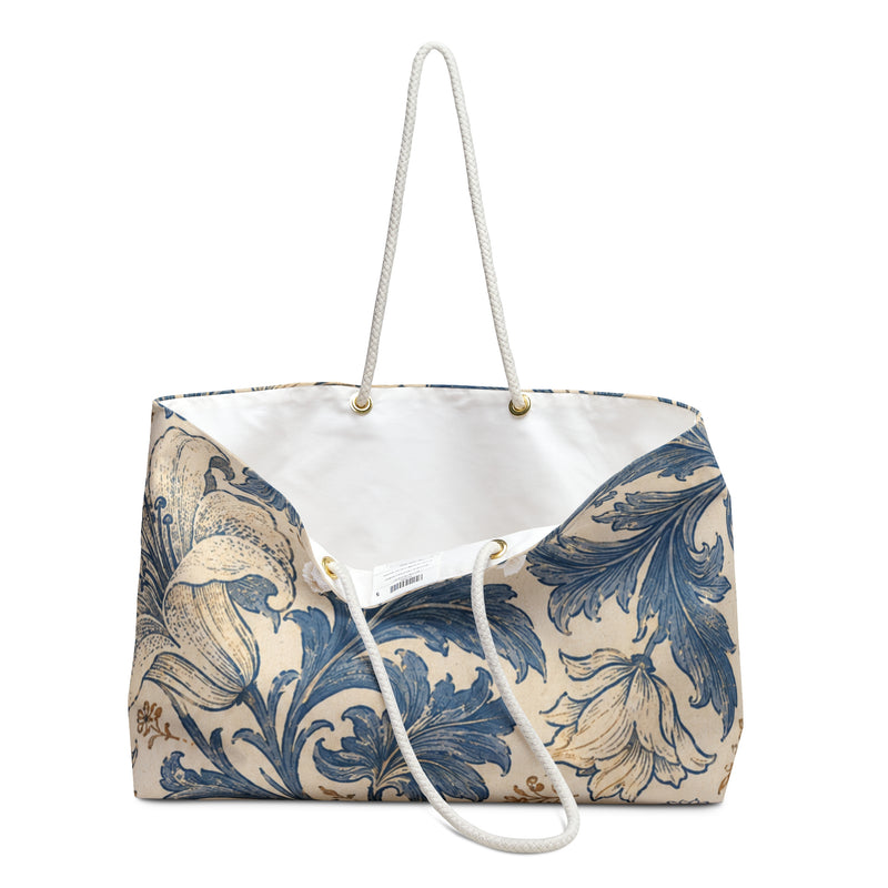 Floral Vintage Blue Weekender Bag — close-up of the fabric print and hardware detail, painterly indigo-blue and cream floral print