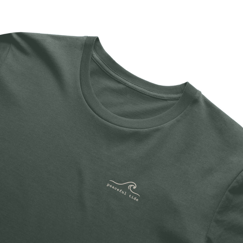 Goods for the Soul Tee in Blue Spruce — on model, side view