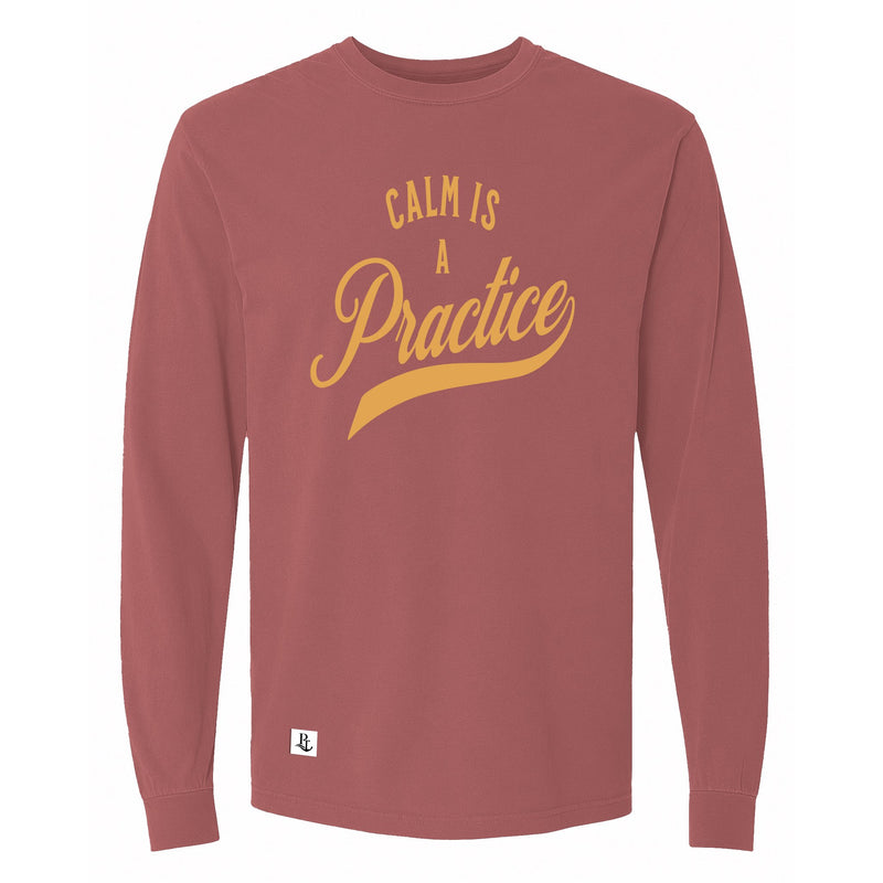 Calm Is a Practice Long Sleeve Tee in Brick, front view on model