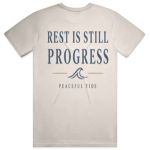 Rest Is Still Progress Tee in Ivory — folded flat