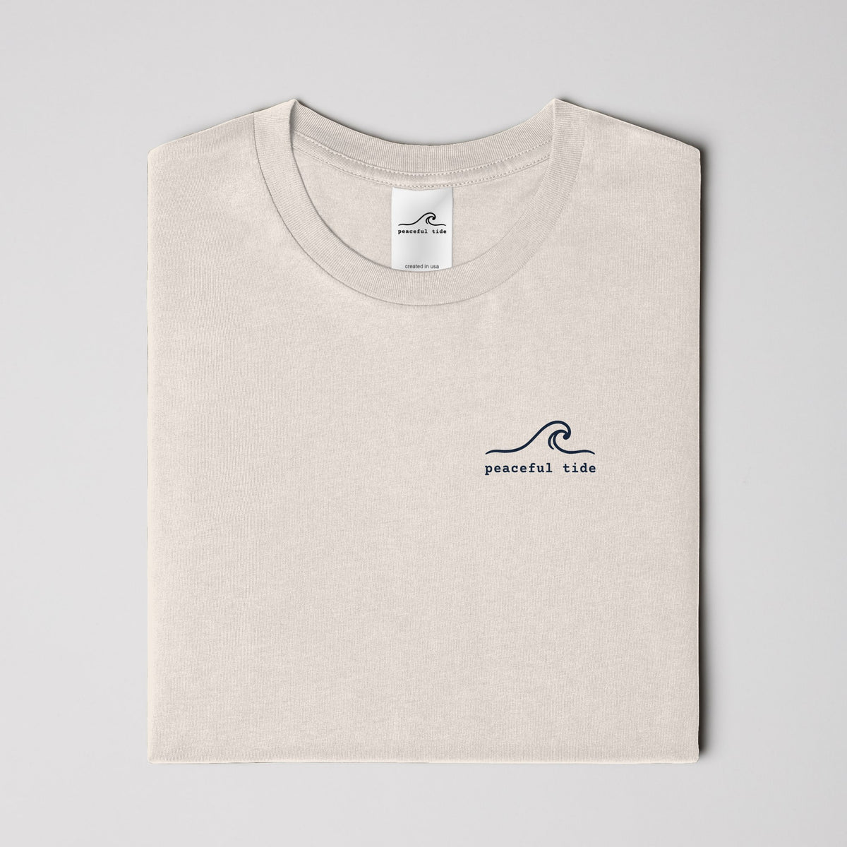 Rest Is Still Progress Tee in Ivory — on model, side view
