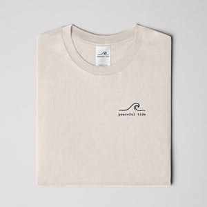 Rest Is Still Progress Tee in Ivory — on model, side view