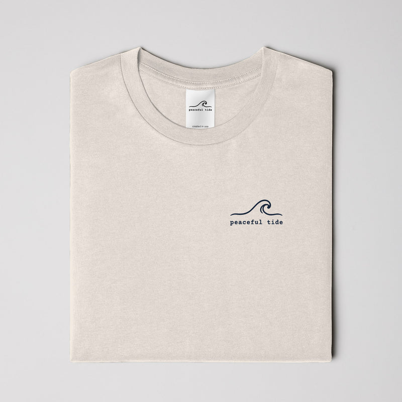Rest Is Still Progress Tee in Ivory — on model, side view