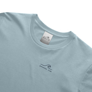 Rest Is Still Progress Tee in chambray — on model, front view