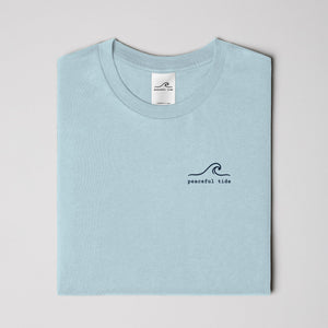 Rest Is Still Progress Tee in chambray — on model, side view