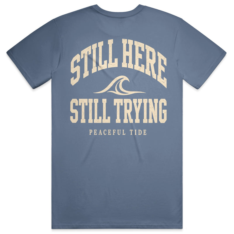 Still Here Still Trying Mental Health Awareness Tee in Blue Jean — Back, worn on model