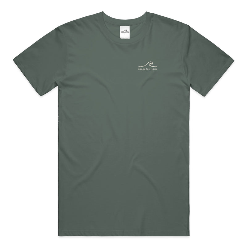Still Here Still Trying Mental Health Awareness Tee in Blue Spruce — Front, worn on model