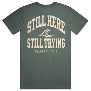 Still Here Still Trying Mental Health Awareness Tee in Blue Spruce — Back, worn on model