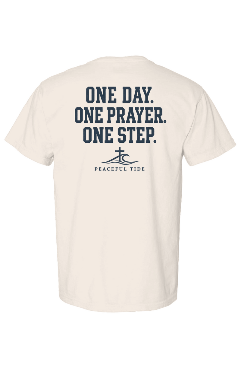 One Day, One Prayer, One Step Tee in Ivory — Back, worn on model