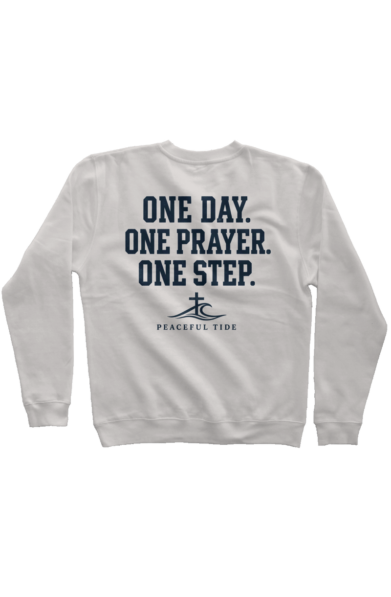 One Day, One Step, One Prayer Sweatshirt in Pigment Ivory, worn by a model, back view
