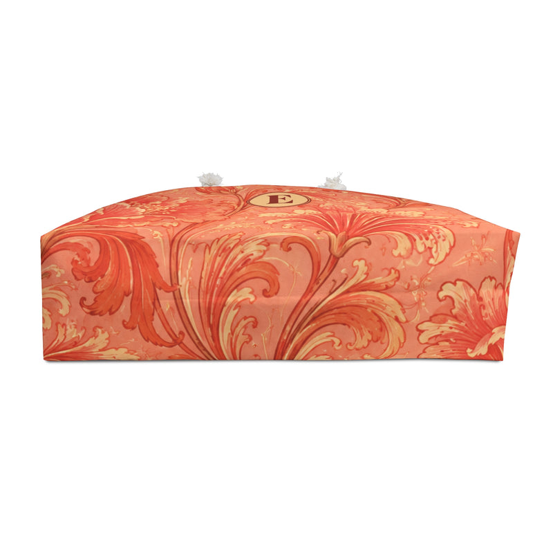 Coral Floral Monogram E Weekender Bag — interior lining view with the bag partially open, painterly coral-and-terracotta floral pattern