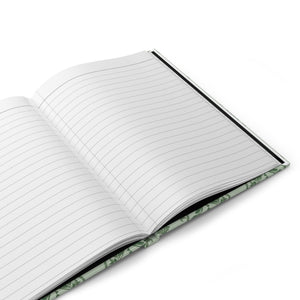 Sage Damask Hardcover Journal styled on a desk with stationery