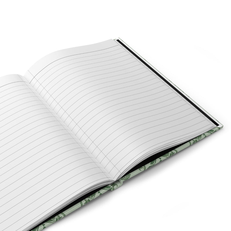 Sage Damask Hardcover Journal styled on a desk with stationery