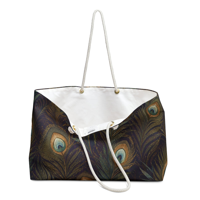 Close-up of the gold-tone grommets and peacock feather detail on the Peacock Feather Weekender Bag