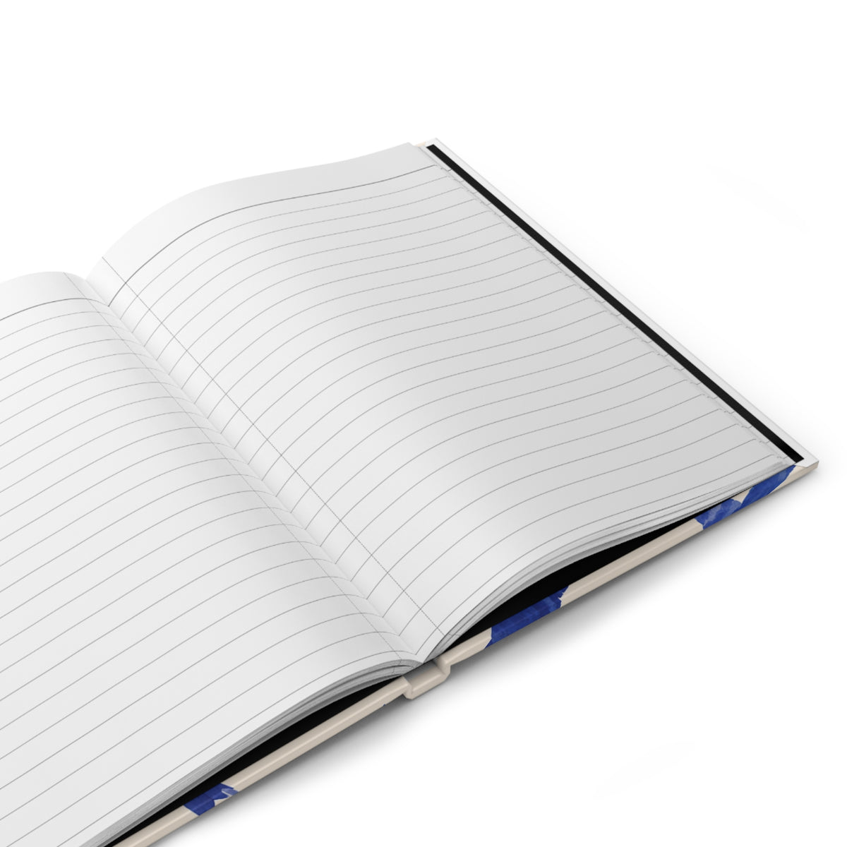 Blue Swallow Hardcover Journal styled on a desk with a pen