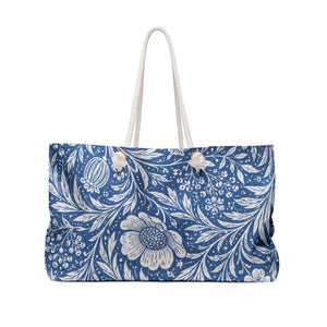 Blue Floral Weekender Bag – side view highlighting the cream cotton rope handles and gold-tone grommets