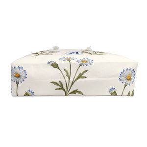 Monogram A Daisy Weekender Bag — interior lining view with the bag partially open, soft blue daisy print on cream canvas