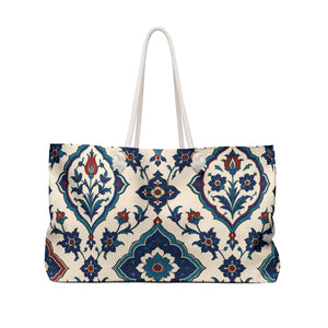 Monogrammed "H" Azulejo Weekender Bag – side view highlighting the cream cotton rope handles and gold-tone grommets