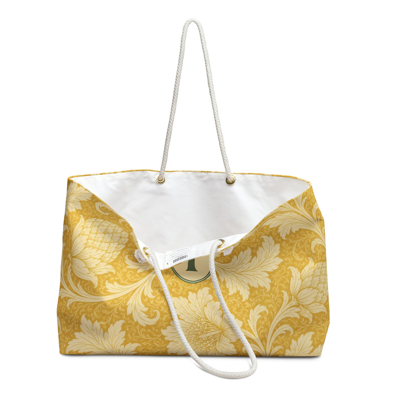 Monogrammed "I" Yellow Damask Weekender Bag – close-up detail of the monogrammed "I" on the yellow damask print